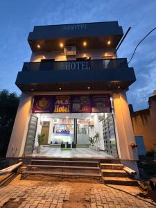 a hotel with the front of a building at MShotel Surajgarh in Sūrajgarh