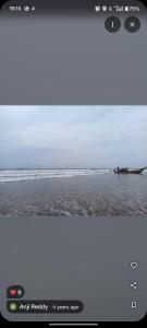 a picture of a boat in the water at YVs Hungry island in Bāpatla