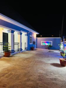 an empty parking lot in a building at night at Flexxy Apartment Hotel in Oshogbo