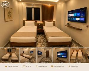 a hotel room with two beds and a flat screen tv at HOTEL GILL TOWER (GRAND) in Hanumāngarh