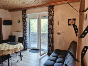 a living room with a couch and a table at Alie Gusta in Hermagor