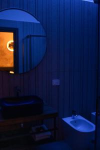 a bathroom with a sink and a mirror at B&B in centro in Eboli