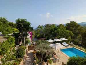 an aerial view of a resort with a swimming pool at Can Pardal in Sant Miquel de Balansat