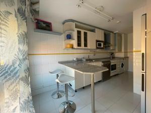 a kitchen with a sink and a counter top at TXIMELETA Haro in Haro +11 photos