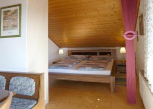 Postel nebo postele na pokoji v ubytování Ferienwohnung Eichler