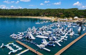 an aerial view of a water park with a bunch of water slides at MAISON BISCARROSSE LAC 6 pers in Biscarrosse