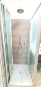 a shower with a glass door in a bathroom at Dei Della Costiera in Agerola +290 photos