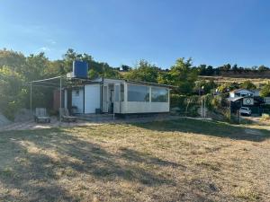 a home with a large yard with a house at домик у самого моря in Odesa +2 photos