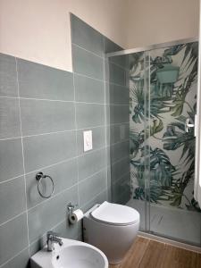 a bathroom with a toilet and a sink at Residence Prato in Trapani