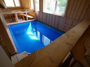 a swimming pool in a house under construction at KarpatskeDzerelo in Roztoky