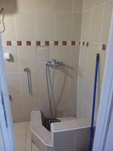a bathroom with a tub and a sink and a shower at Dusica in Vrnjačka Banja +20 photos