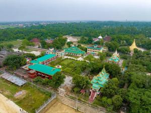 an overhead view of a park with buildings and trees at Hotel MAQ Lumbini in Rummindei