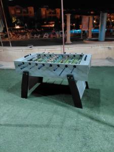 a ping pong table sitting in the middle of a street at Family-Friendly Chalet at Piacera, Ain Sokhna in Ain Sokhna