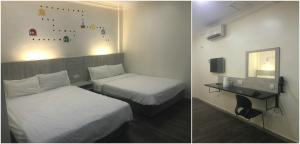 Postel nebo postele na pokoji v ubytování Tambun Inn Hotel