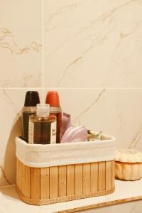 a wooden container sitting on a shelf in a bathroom at Apartament w Parku 2 in Żywiec