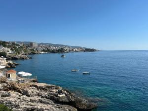 a large body of water with boats in it at Villa Bakic in Dobra Voda