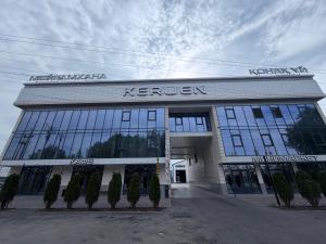 a building with a sign on top of it at Keruen in Almaty