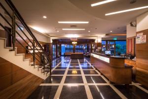 a lobby of a hotel with a bar at Wulai SungLyu Hot Spring Resort in Wulai