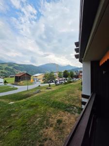 a view from a house window of a street at Utoring Acletta B 27 in Disentis