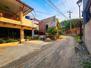 an empty street next to a building at Hotel Casa Teofista in Panglao Island +27 photos