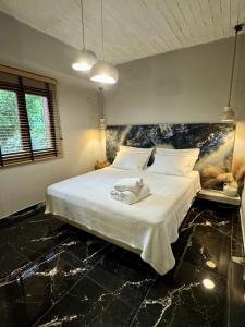 Un pat sau paturi într-o cameră la The Park House
