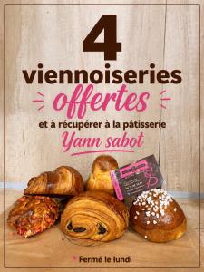 a poster of different types of pastries on a table at La petite suite Ponote in Le Puy-en-Velay +3 photos