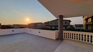 a balcony with a view of a city at Il cedro blu in Santa Maria del Cedro