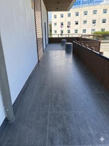 an empty balcony of a building with a building at Hotel A&M Mostoles-Alcorcon-M506 in Alcorcón +21 photos