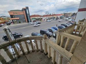 a view of a city with cars parked on the street at Oscar Hotel Guba in Quba