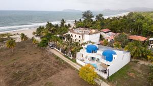 an aerial view of a house next to the beach at Casa Sofia 19 Guests, Steps From The Sea in Tela