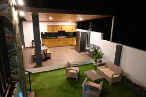 an aerial view of a kitchen and living room at villa serenity in Jarabacoa