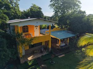 an overhead view of a house with a swimming pool at Los Tecales Hostal in Santa Catalina +9 photos