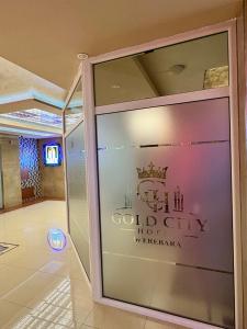 a window of a gold city hotel in mykonos at Gold City Hotel by Erebara in Debar +60 photos