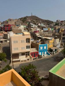 a view of a city with buildings on a hill at S Vicente Live in Mindelo
