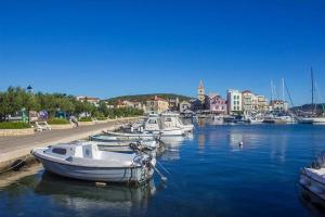 a group of boats are docked in a harbor at Villa Mare Pirovac in Pirovac