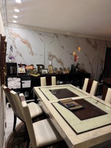 a dining room with a table and chairs at Mac B&B in Ottawa