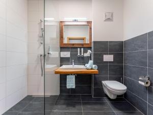 a bathroom with a sink and a toilet at Bösenstein in Hohentauern +32 photos