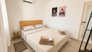Llit o llits en una habitació de Piccolo cielo