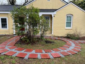 a stepping stone path in front of a house at Cute 2 bedroom home ! in Augusta