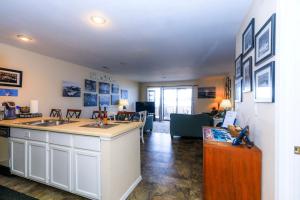 a room with a kitchen and a living room at Pool Days & Water Fun Await: Lake Ozark Escape! in Lake Ozark