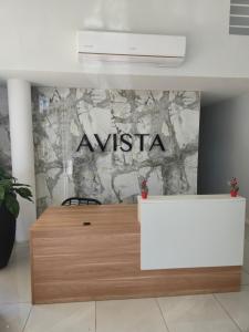 a wall mural with the word austria on it at City View Luxe Condo in Mandeville
