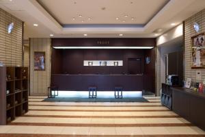 a view of the front of a hair salon with two chairs at Hotel Hokke Club Hakodate in Hakodate