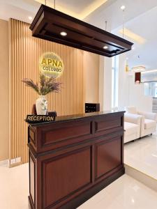 a lobby with a reception desk in a room at Apna Colombo in Nawala