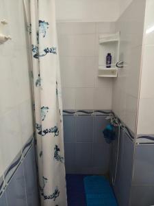 a bathroom with a shower with a shower curtain at Rabat hassan in Rabat +22 photos
