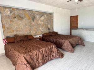 Gallery image of Hotel Villa las Palomas in La Pesca +4 photos