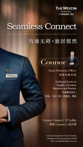 a poster of a man in a suit at The Westin Guangzhou in Guangzhou
