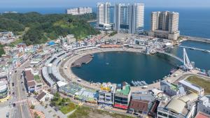 an aerial view of a city with a harbor at Sokcho Maru Pension in Sokcho +12 photos