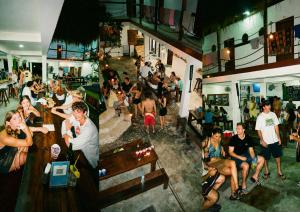 an overhead view of a crowd of people in a restaurant at Gili Pirates Dive & Social Hostel in Gili Trawangan