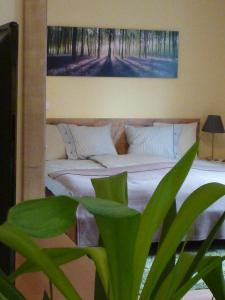 Ein Bett oder Betten in einem Zimmer der Unterkunft Apartment Kleßheim