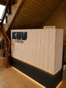 a podium with a sign on top of it at LIV Coron in Coron